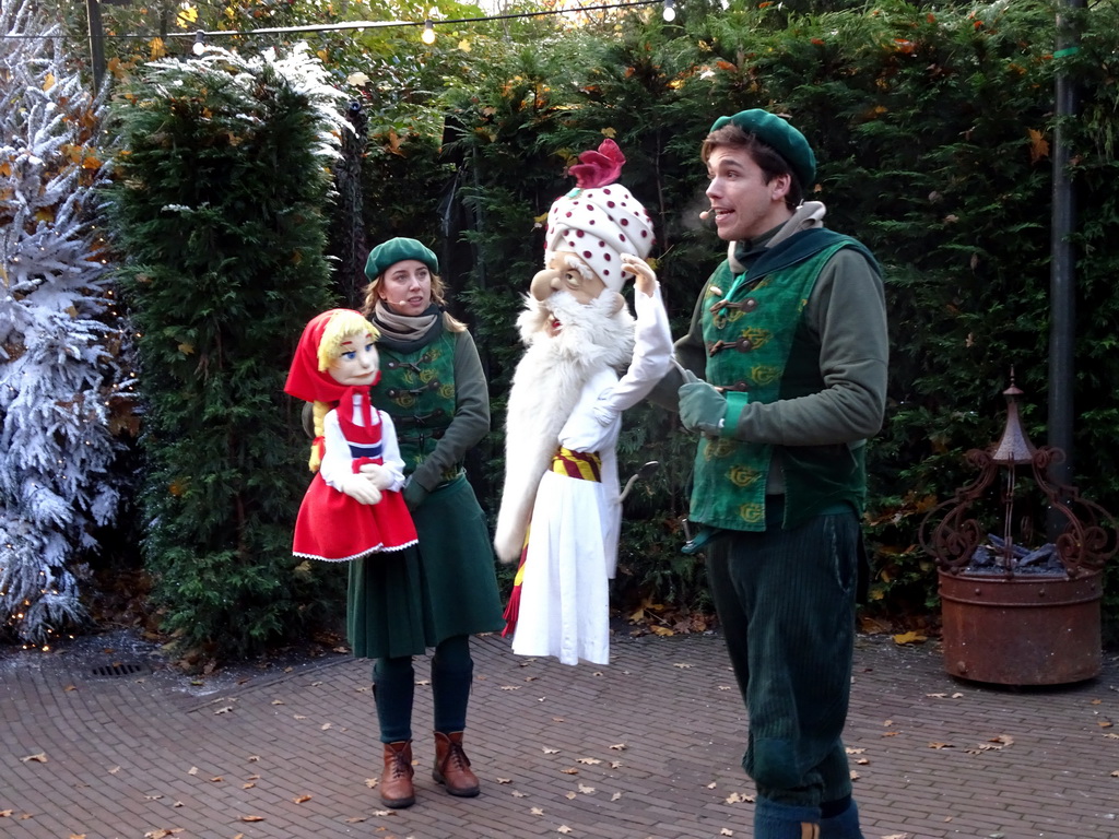 Actors with hand puppets during the Sprookjesboom Show at the Open-air Theatre at the Fairytale Forest at the Marerijk kingdom, during the Winter Efteling