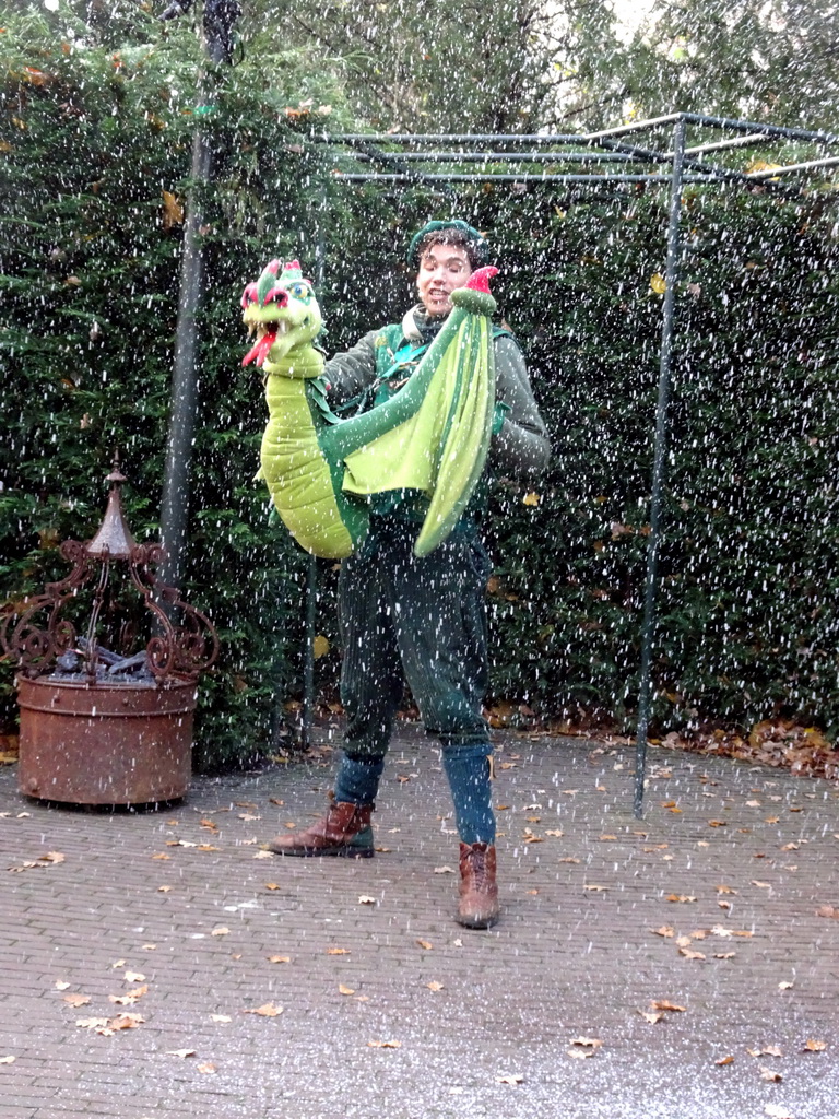 Actor with hand puppet during the Sprookjesboom Show at the Open-air Theatre at the Fairytale Forest at the Marerijk kingdom, during the Winter Efteling