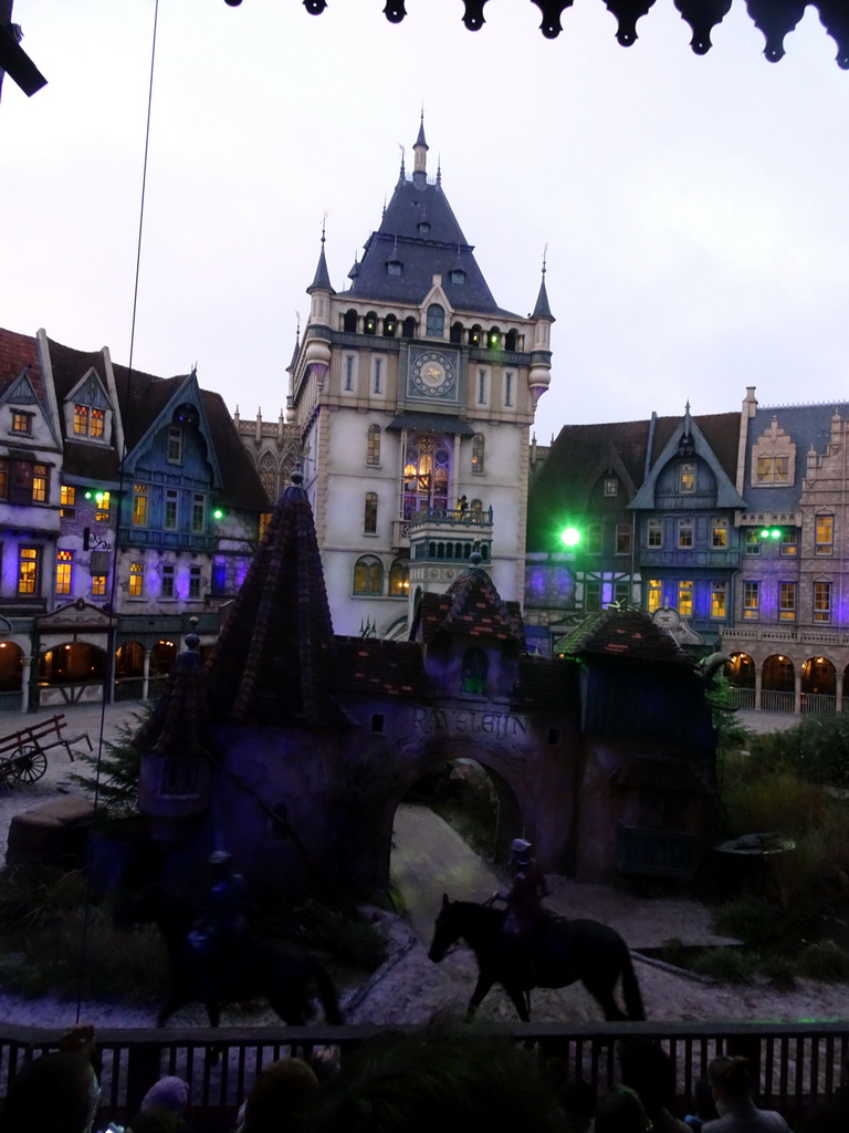 Actors and horses on the stage of the Raveleijn theatre at the Marerijk kingdom, during the Raveleijn Parkshow at the Winter Efteling, at sunset