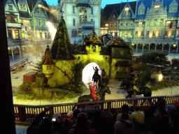 Actors and horses on the stage of the Raveleijn theatre at the Marerijk kingdom, during the Raveleijn Parkshow at the Winter Efteling, at sunset