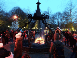 Bonfire at the Ton van de Ven Square at the Marerijk kingdom, during the Winter Efteling, at sunset