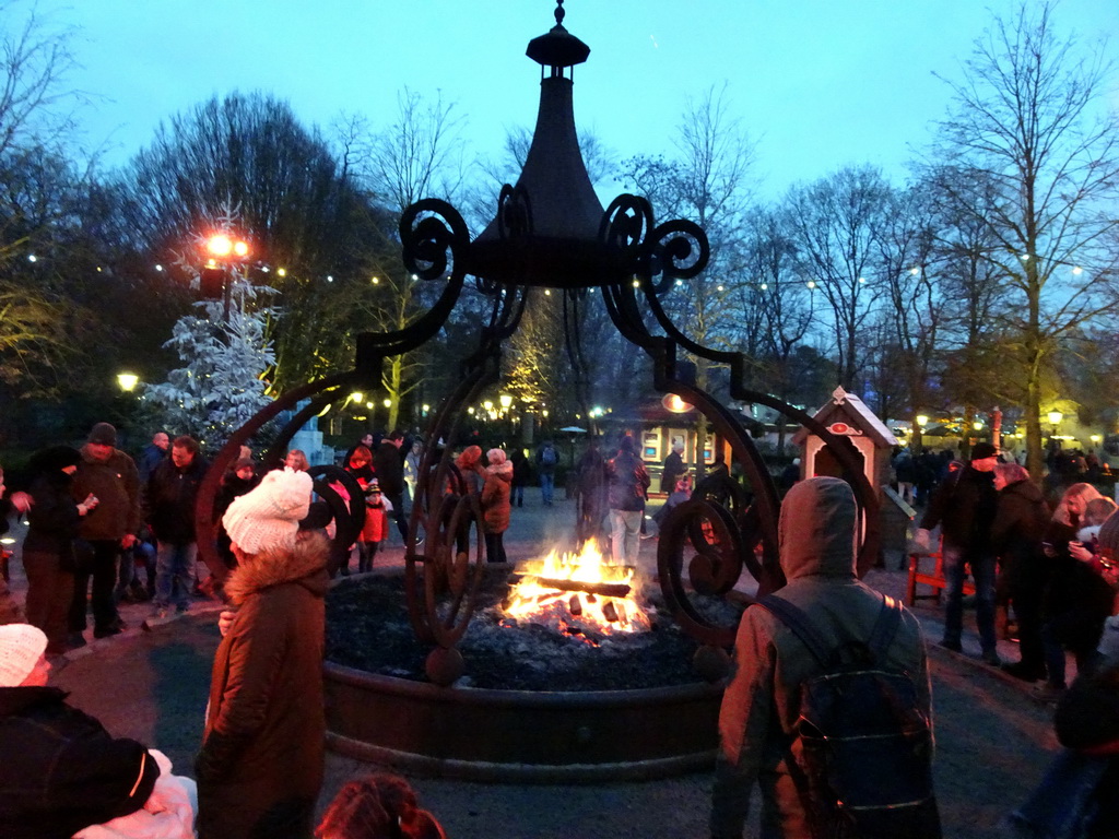 Bonfire at the Ton van de Ven Square at the Marerijk kingdom, during the Winter Efteling, at sunset