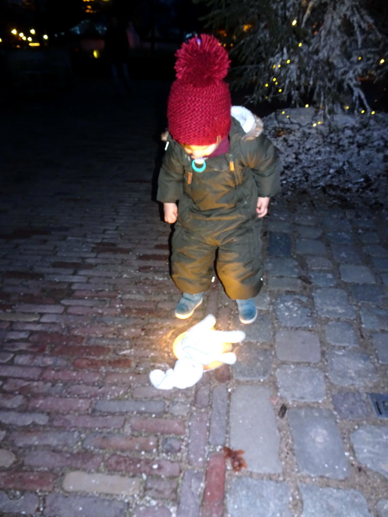 Max at the Ton van de Ven Square at the Marerijk kingdom, during the Winter Efteling, by night