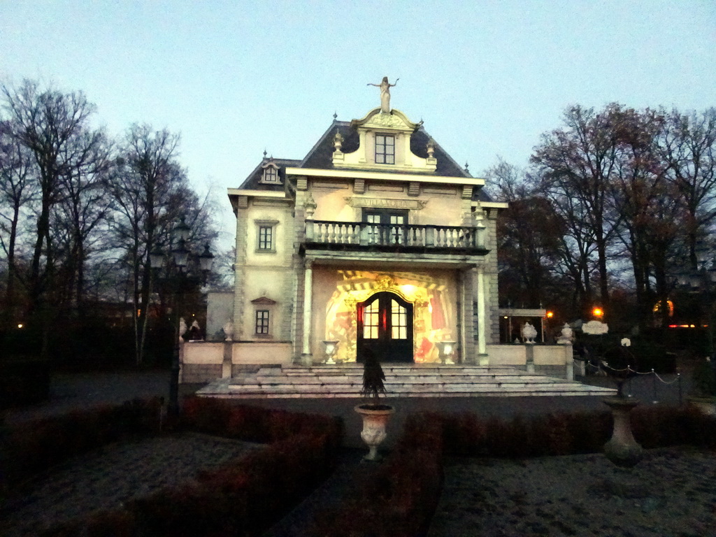 Front of the Villa Volta attraction at the Marerijk kingdom, during the Winter Illusion light show at the Winter Efteling, by night