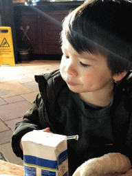 Max having a pancake at the Polles Keuken restaurant at the Fantasierijk kingdom