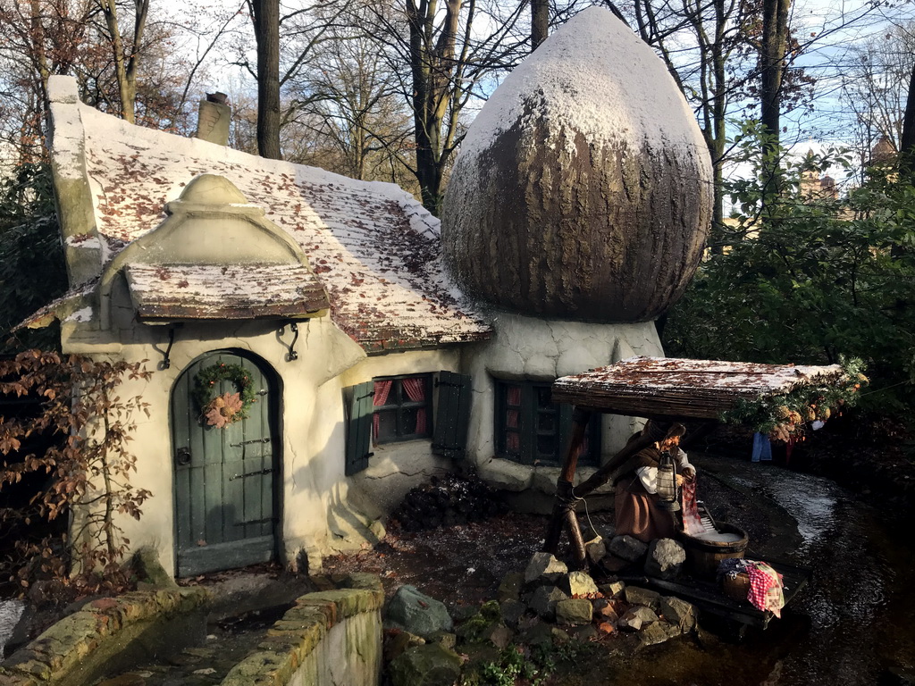 Gnome doing laundry at the Gnome Village attraction at the Fairytale Forest at the Marerijk kingdom, during the Winter Efteling