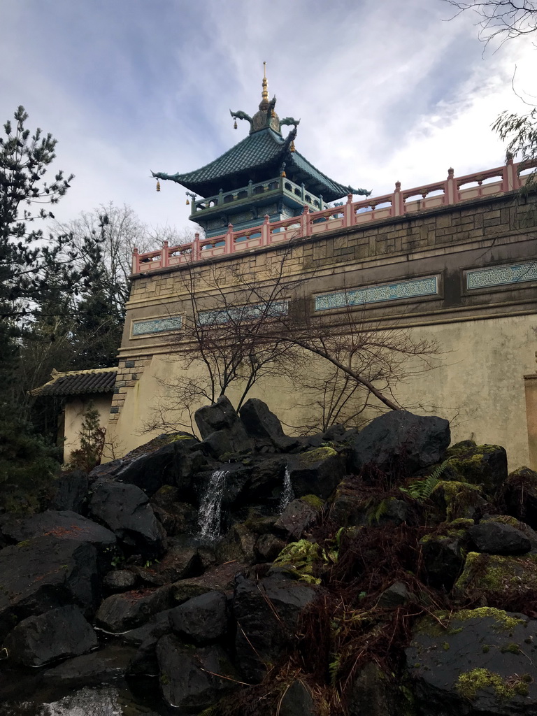 Waterfall in front of the Chinese Nightingale attraction at the Fairytale Forest at the Marerijk kingdom, during the Winter Efteling