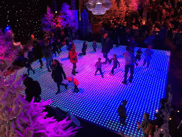 Dance floor at the IJspaleis attraction at the Reizenrijk kingdom, viewed from the tubing slide, during the Winter Efteling