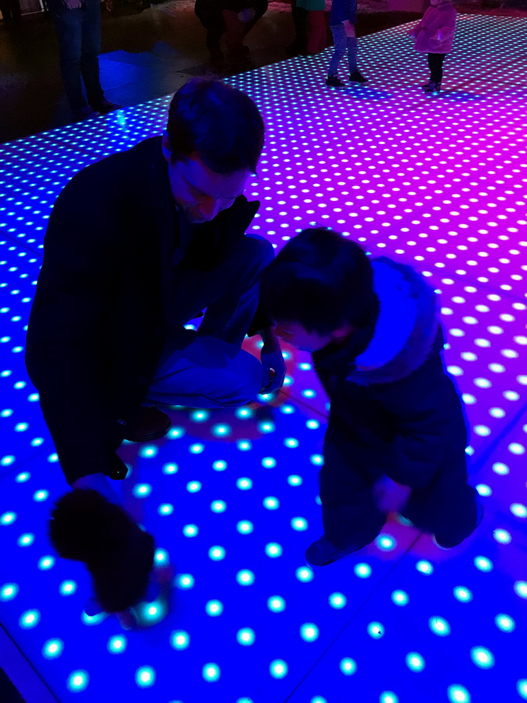 Tim and Max on the dance floor at the IJspaleis attraction at the Reizenrijk kingdom, during the Winter Efteling