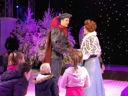 Actors and visitors during the `Fire Prince and Snow Princess` show at the IJspaleis attraction at the Reizenrijk kingdom, during the Winter Efteling