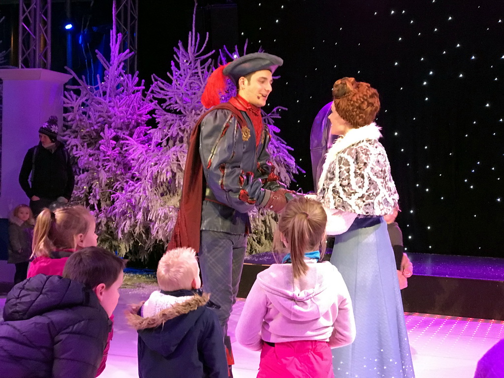 Actors and visitors during the `Fire Prince and Snow Princess` show at the IJspaleis attraction at the Reizenrijk kingdom, during the Winter Efteling