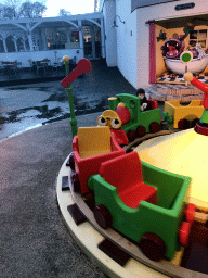 Max on the train at the Kleuterhof playground at the Reizenrijk kingdom, during the Winter Efteling, at sunset