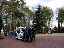 Horses and carriage and the Wish Tree attraction at the Fantasierijk kingdom, during the Winter Efteling