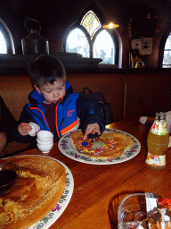 Max having a pancake at the Polles Keuken restaurant at the Fantasierijk kingdom, during the Winter Efteling