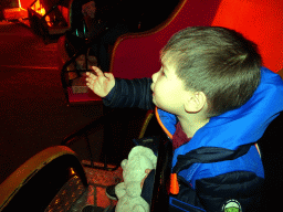 Max waving goodbye at the final scene at the Carnaval Festival attraction at the Reizenrijk kingdom, during the Winter Efteling