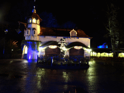 Statue of Pardoes and the front of the Polles Keuken restaurant at the Fantasierijk kingdom, during the Winter Efteling, by night