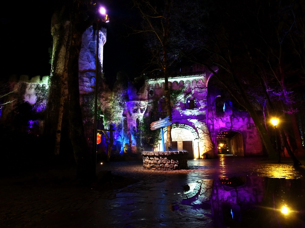 The Abominable Snowman attraction and the Spookslot attraction at the Anderrijk kingdom, during the Winter Efteling, by night