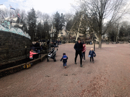 Max in front of the Polka Marina and Halve Maen attractions at the Ruigrijk kingdom