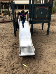 Max at the slide of the Kindervreugd playground at the Marerijk kingdom