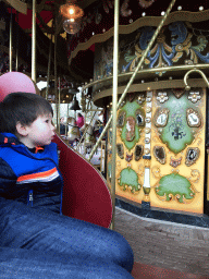 Tim and Max in the Vermolen Carousel at the Anton Pieck Plein square at the Marerijk kingdom
