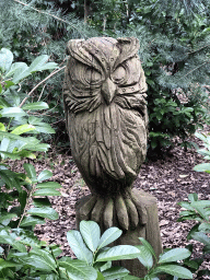 Wooden owl statue next to Geppetto`s House at the Pinocchio attraction at the Fairytale Forest at the Marerijk kingdom