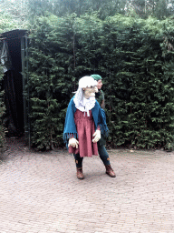 Actor with hand puppet during the Sprookjesboom Show at the Open-air Theatre at the Fairytale Forest at the Marerijk kingdom