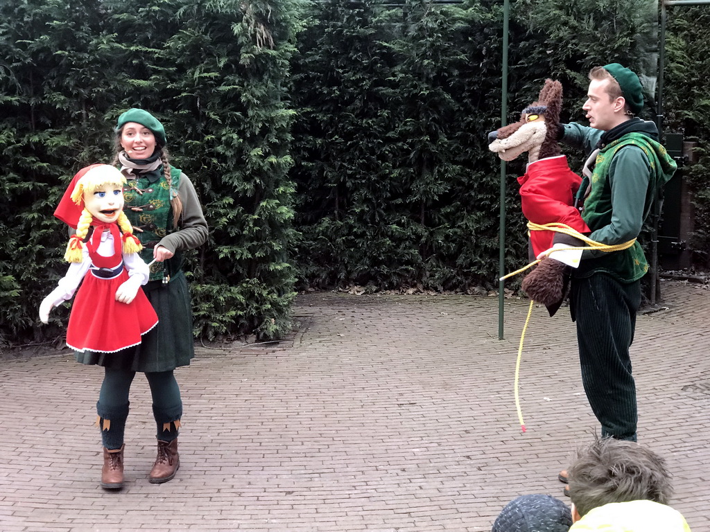 Actors with hand puppets during the Sprookjesboom Show at the Open-air Theatre at the Fairytale Forest at the Marerijk kingdom