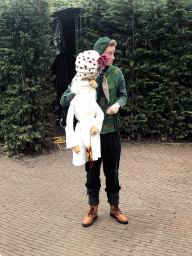 Actor with hand puppet during the Sprookjesboom Show at the Open-air Theatre at the Fairytale Forest at the Marerijk kingdom