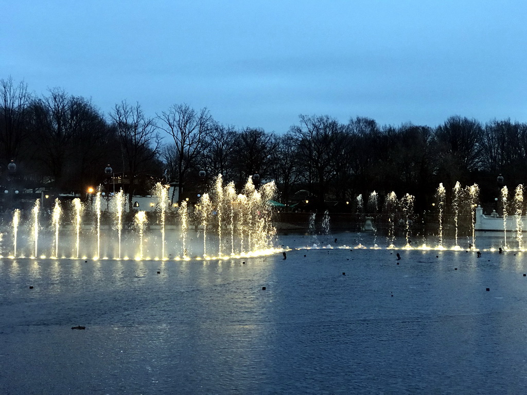 The Aquanura lake at the Fantasierijk kingdom, during the water show, at sunset