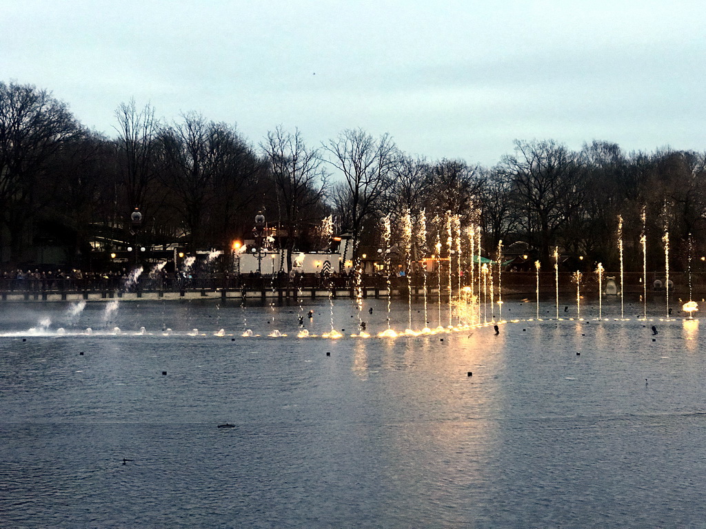 The Aquanura lake at the Fantasierijk kingdom, during the water show, at sunset