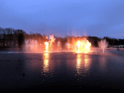 The Aquanura lake and fire at the Fantasierijk kingdom, during the water show, at sunset