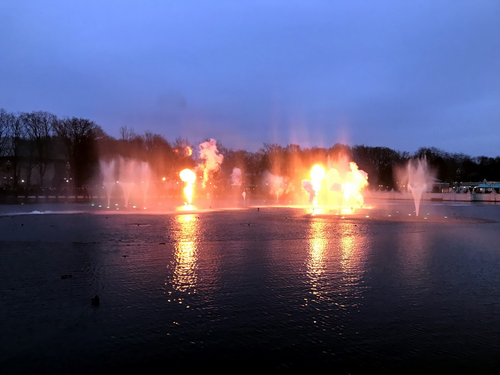 The Aquanura lake and fire at the Fantasierijk kingdom, during the water show, at sunset