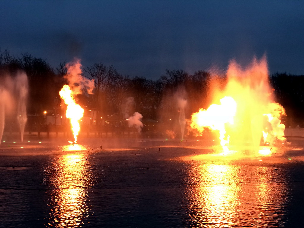 The Aquanura lake and fire at the Fantasierijk kingdom, during the water show, at sunset