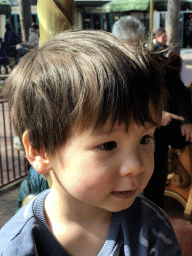 Max at the Vermolen Carousel at the Anton Pieck Plein square at the Marerijk kingdom