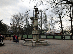 Fountain at the Ruigrijkplein square and the Python attraction, under renovation, at the Ruigrijk kingdom