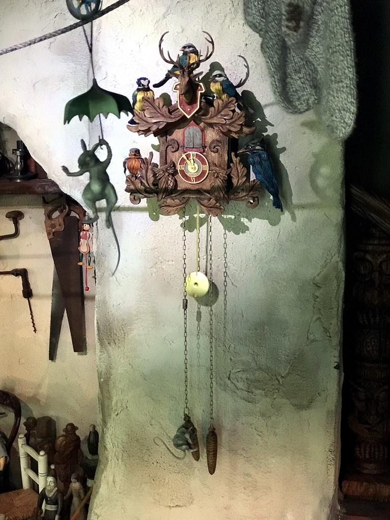 Mice and clock in Geppetto`s House at the Pinocchio attraction at the Fairytale Forest at the Marerijk kingdom