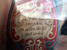 Text on a clock in the Little Red Riding Hood attraction at the Fairytale Forest at the Marerijk kingdom