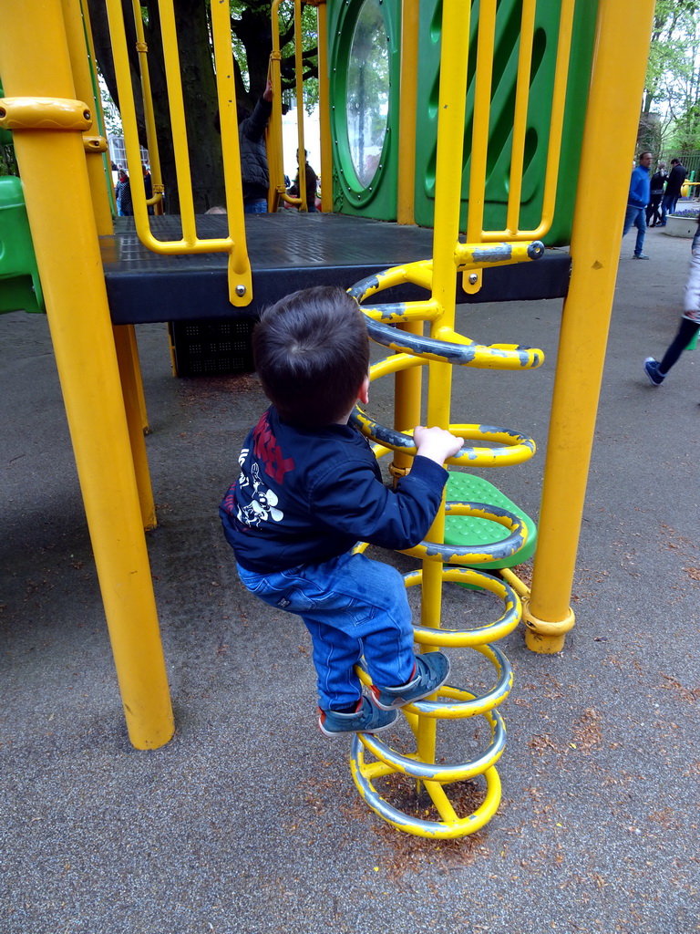 Max on a staircase at the Kleuterhof playground at the Reizenrijk kingdom