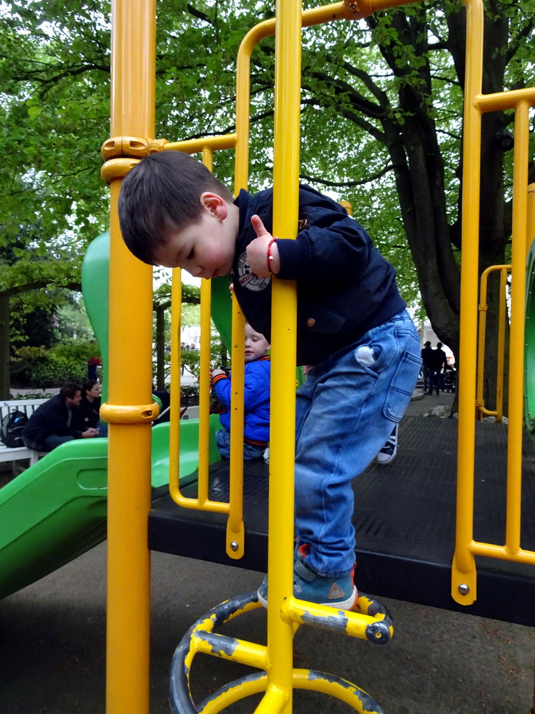 Max on a staircase at the Kleuterhof playground at the Reizenrijk kingdom