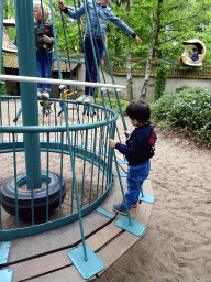 Max on a swing at the Kindervreugd playground at the Marerijk kingdom