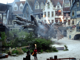 Actors and dragon spitting fire on the stage of the Raveleijn theatre at the Marerijk kingdom, during the Raveleijn Parkshow