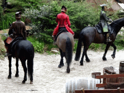 Actors and horses on the stage of the Raveleijn theatre at the Marerijk kingdom, during the Raveleijn Parkshow