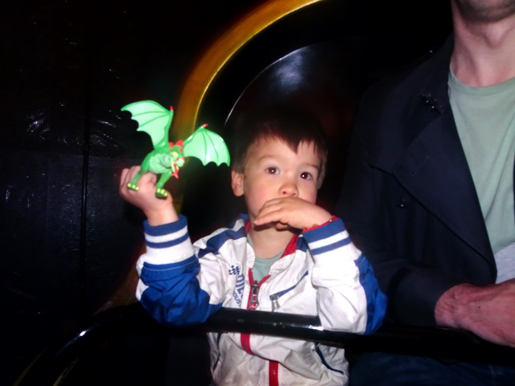 Max with a dragon toy at the Carnaval Festival attraction at the Reizenrijk kingdom