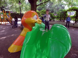 Max on a slide at the Kleuterhof playground at the Reizenrijk kingdom