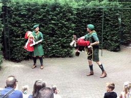 Actors with hand puppets during the Sprookjesboom Show at the Open-air Theatre at the Fairytale Forest at the Marerijk kingdom