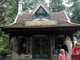 Max in front of Geppetto`s House at the Pinocchio attraction at the Fairytale Forest at the Marerijk kingdom