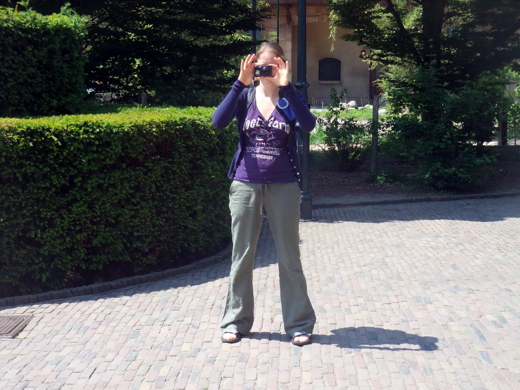 Our friend taking pictures outside the Villa Volta attraction at the Marerijk kingdom