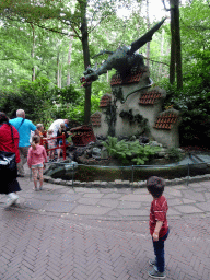 Max in front of the Dragon attraction at the Fairytale Forest at the Marerijk kingdom