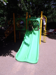 Max on the slide at the Kleuterhof playground at the Reizenrijk kingdom