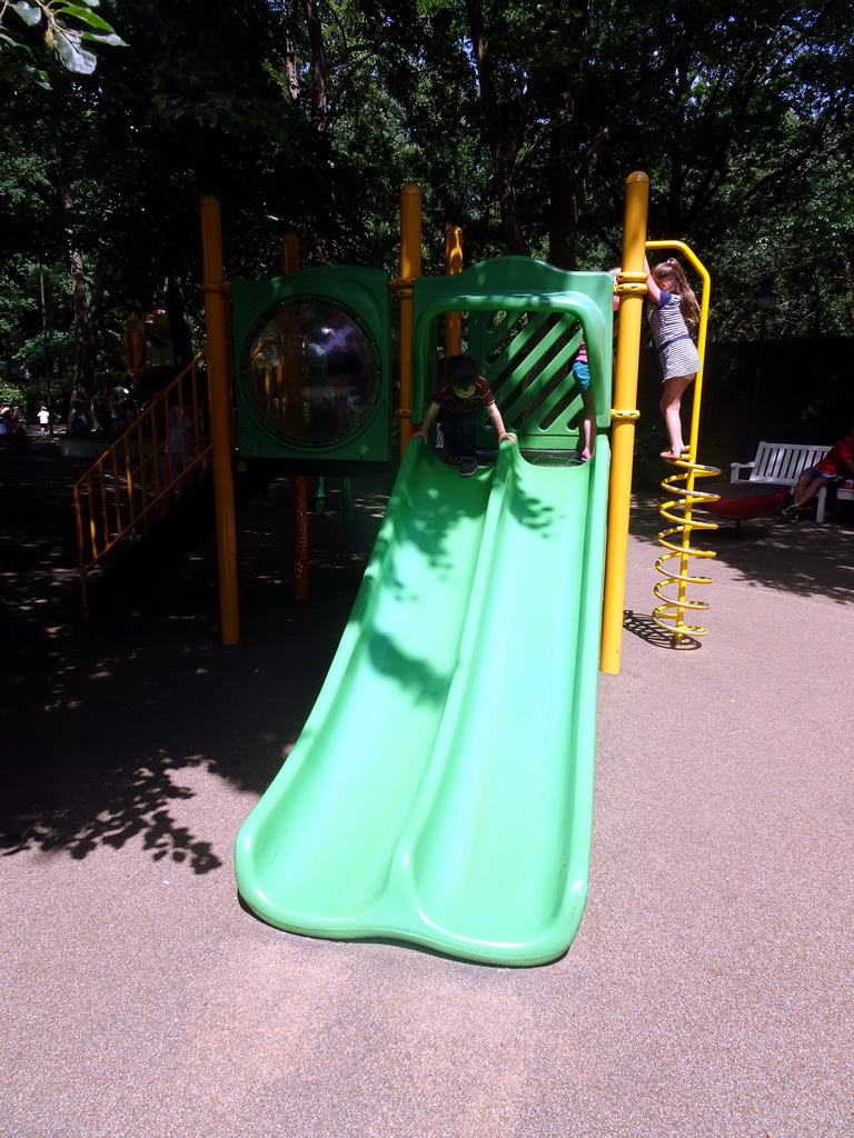 Max on the slide at the Kleuterhof playground at the Reizenrijk kingdom